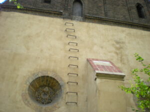 Iron bars forming a ladder up the Old New Synagogue